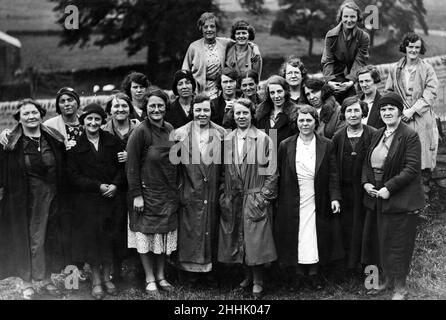 Un gruppo di felicissimi campeggiatori nel campo di Sparty Lea per le mogli di disoccupati Tyneside. 22nd settembre 1933. Foto Stock