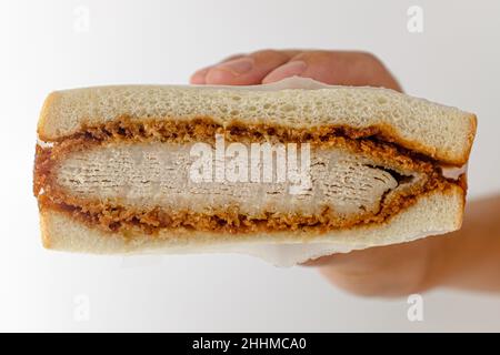 Sandwich Tonkatsu su su sfondo bianco Foto Stock