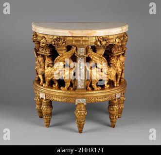 Console dal salotto della casa William H. Vanderbilt 1879–82 Herter Brothers William H. Vanderbilt, figlio di Cornelius “Commodore” Vanderbilt, ereditò una grande fortuna e un redditizio settore dei trasporti, che espanse in modo esponenziale, diventando uno degli uomini più ricchi d’America. Nel 1879, per segnare il suo elevato status sociale ed economico, costruì un palazzo che abbracciò un intero blocco cittadino sulla Fifth Avenue, tra le cinquantunne e cinquanta secondi. Commissionò a Herter Brothers, una delle più importanti aziende di produzione di cabinettistica di New York City, di decorare e arredare la sua casa. In devis Foto Stock