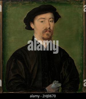 Ritratto di un uomo con Guanti 1540–45 attribuito a Corneille de Lyon Netherlandish la sorprendente formalità della posa di questa sitter che tiene guanti, e il suo indirizzo diretto dello spettatore, può indicare la sua posizione prominente nella società. Ritratto di un uomo con guanti 435955 Foto Stock