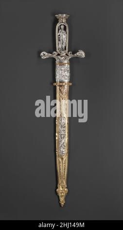 Caccia spada con scabbard ca. 1851 Francese, Parigi questa spada di caccia è un capolavoro dello stile Gotico Revival e una dimostrazione virtuosa del design e dell'artigianato della metà del XIX secolo, che furono fortemente stimolati dalla serie di mostre internazionali che si tennero a Londra e Parigi nel 1840s–60s. È praticamente identica a quella eseguita da un artigiano altrimenti non registrato, Marcet, per la ditta parigina di argentini e gioiellieri Marrel Frères, che è stato mostrato alla Grande Mostra tenutasi al Crystal Palace di Londra, nel 1851. Quella spada è stata elogiata in modo particolare dalla mostra" Foto Stock