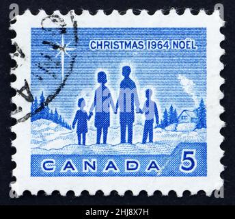 CANADA - CIRCA 1964: Un francobollo stampato in Canada mostra Famiglia e Stella di Betlemme, Natale, circa 1964 Foto Stock