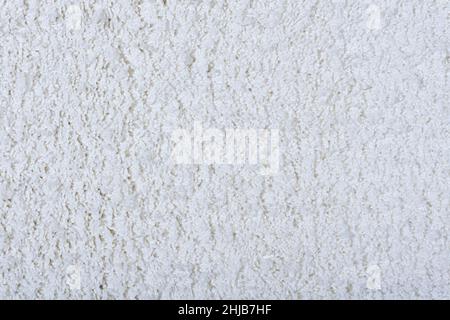 Sfondo texture tappeto. Tappeto in cotone bianco per pavimenti. Materiale per il design e la decorazione degli interni dei salotti. Foto di alta qualità Foto Stock