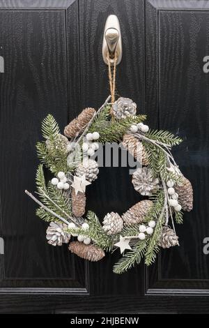 Ghirlanda di Natale sulla porta Foto Stock