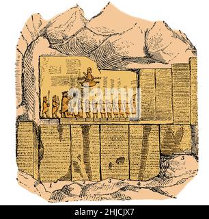 L'Iscrizione Behistun è un grande rilievo roccioso su una scogliera al Monte Behistun vicino alla città di Kermanshah, Iran. Autore di Dario il Grande tra il 522 a.C. e il 486 a.C., l'iscrizione include una breve autobiografia e una storia vittoriosa della battaglia. Il testo appare in tre linguaggi di script cuneiformi: Vecchio persiano, Elamite e Babilonese. Illustrazione di Edward Clod's The Story of the Alphabet, 1900. Colorato. Foto Stock