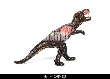 Giocattolo di plastica di dinosauro isolato su sfondo bianco. Giocattolo di dinosauro Tyrannosaurus. Foto Stock