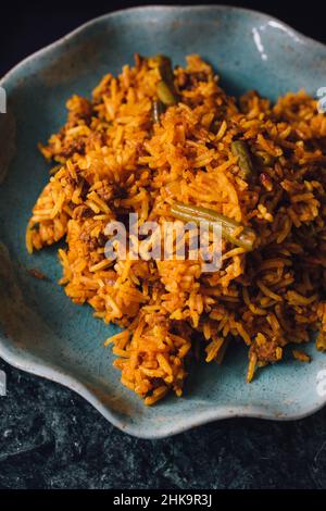 Polo di Lubia piatto di riso persiano con manzo macinato, fagioli verdi, curcuma Foto Stock