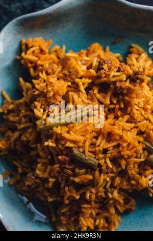 Polo di Lubia piatto di riso persiano con manzo macinato, fagioli verdi, curcuma Foto Stock