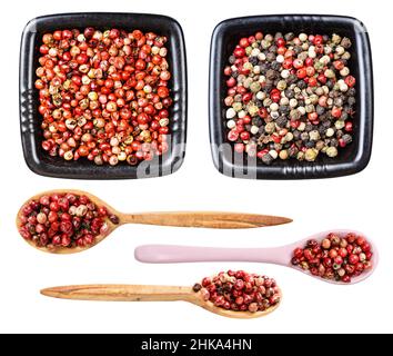set di vari grani di pepe rosa (rosa baie) isolati su sfondo bianco Foto Stock
