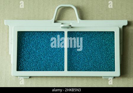Primo piano di un filtro pulito diffusore di un aspirapolvere per pulizia a umido. Foto Stock