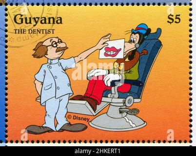 GUYANA - CIRCA 1995: Francobollo stampato da Guyana, mostra i personaggi di Walt Disney, Goofy, circa 1995 Foto Stock