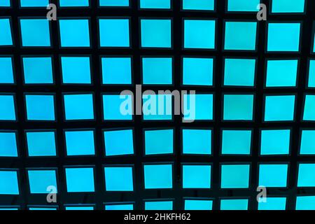 Blu neon vivaci piastrelle quadrate sfondo moderno. Foto Stock