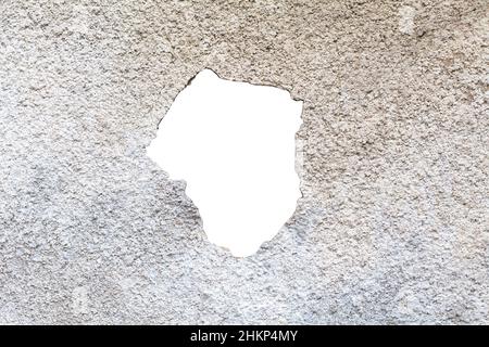 Vuoto buco vuoto in un muro di costruzione, forma bianca ritagliata, segnaposto, crepa, sagoma di parete danneggiata incrinata, elemento di disegno. Sneak peek, peaking, look Foto Stock