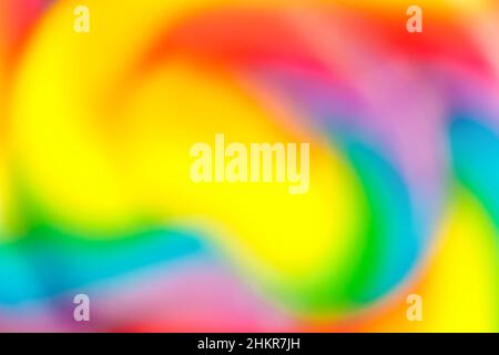 sfondo astratto multicolore, arcobaleno spirale lollipop primo piano, sfocatura Foto Stock