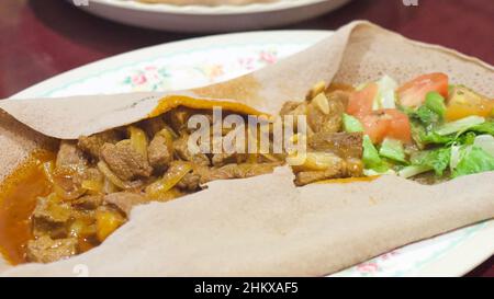 Pasto d'impacco etiope injera in Canada Foto Stock