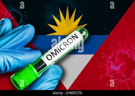 Antigua e Barbuda scoppio della variante omicron. Una mano in un guanto di gomma blu contiene una provetta con omicron virus covid-19 davanti ad Antigua e B. Foto Stock