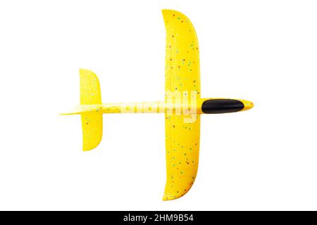Giocattolo giallo dell'aeroplano isolato su sfondo bianco Foto Stock