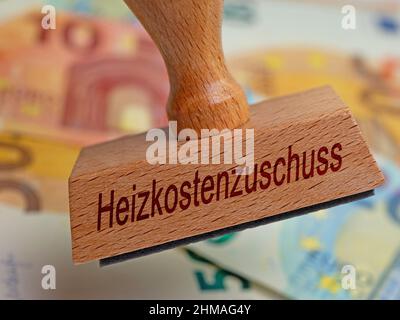 Timbro con l'impronta 'Heizkostenzuschuss', traduzione 'contributo al costo del riscaldamento' Foto Stock