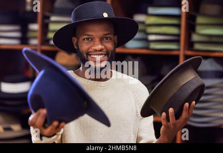 Per me conoscere e connettersi con i miei dipendenti è molto importante. Scatto di un giovane che lavora al suo lavoro in un negozio. Foto Stock