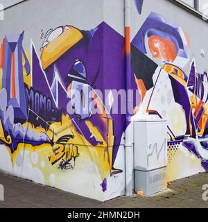 street art, graffiti all'angolo di una casa, Germania, Assia, Cassel Foto Stock