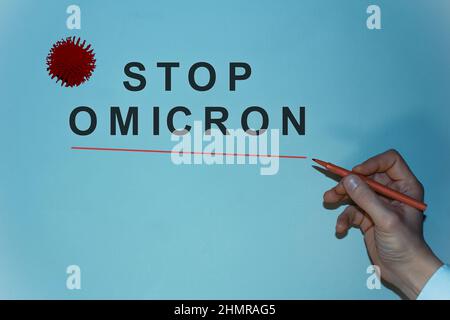 Scrittura manuale 'top omicron' nuovo virus variante. Foto Stock