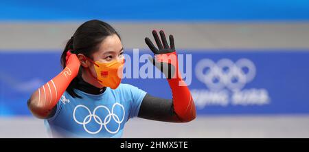 Pechino, Cina. 12th Feb 2022. Li Yuxi della Cina reagisce dopo il calore delle donne scheletro di Pechino 2022 Olimpiadi invernali al National Sliding Center nel distretto di Yanqing, Pechino, capitale della Cina, 12 febbraio 2022. Credit: Yao Jianfeng/Xinhua/Alamy Live News Foto Stock