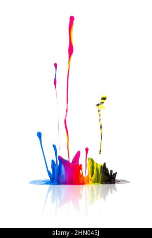 Spruzzi di vernice CMYK isolati sul bianco Foto Stock