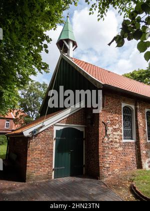 La Chiesa evangelica dell'Isola Luterana fu costruita nel 1696 sull'isola della Frisia Orientale di Spiekeroog. È la chiesa più antica sopravvissuta su un Padre Orientale Foto Stock