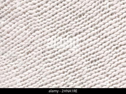 Maglione in lana color caffè in morbido stile. Tessuto caldo in maglia leggera di colore sabbioso. Foto Stock