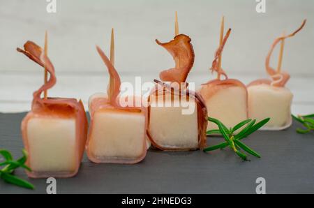 cibo di sottofondo con melone e prosciutto di parma Foto Stock