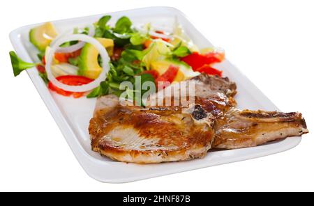 Lombo di maiale fritto con insalata Foto Stock