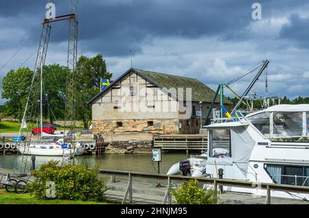 Vista pittoresca del piccolo porto di Sunnana (Sunnana Hamn) al lago Vanern fuori Mellerud, Dalsland, Västra Götalands Län, Svezia. Foto Stock