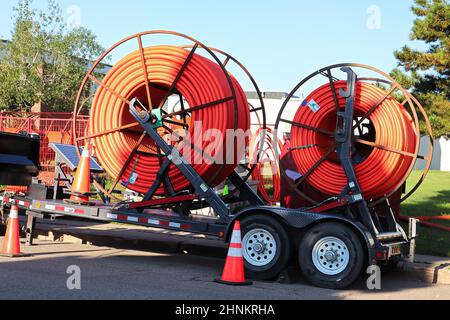 Tubo in plastica per la posa di cavi interrati a spirale Foto Stock