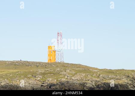 Paesaggio del faro di Hvalnes, punto di riferimento dell'Islanda orientale Foto Stock