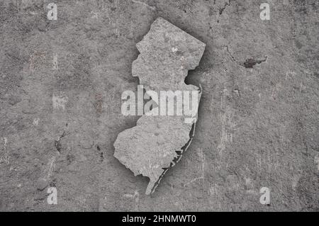 Mappa del New Jersey su cemento intemperie Foto Stock