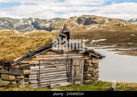 Casa di pietre Vavatn lago in montagna Hemsedal Norvegia. Foto Stock