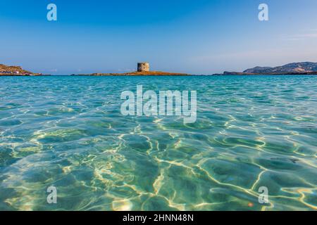 L'incredibile mare e la torre aragonese a la Pelosa Beach, Stintino Foto Stock