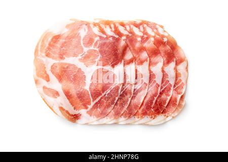 Prosciutto secco italiano. Coppa bagionata isolata su sfondo bianco. Foto Stock