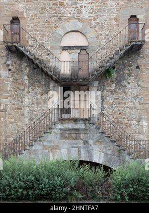 Dettagli esterno di un antico edificio a Firenze, in stile architettonico Escher. Foto Stock
