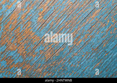 Tessitura senza cuciture di vernice shabby su una superficie di legno. Cracking legno sfondo macro Foto Stock