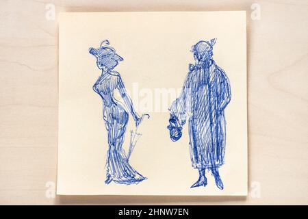 Disegno di una silhouette alla moda di donne degli anni '10 e del '900 del XX secolo disegnata a mano con penna a sfera blu su carta da appunti su tavolo marrone chiaro Foto Stock