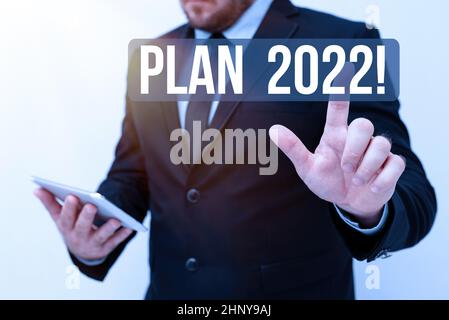 Ispirazione che mostra il piano di sign 2022, Business Concept proposta dettagliata realizzare qualcosa il prossimo anno presentando nuove idee tecnologiche discussione Foto Stock
