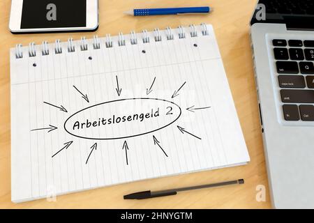 alg2 - Arbeitslosengeld 2 - termine tedesco per l'indennità di disoccupazione o dole money - testo scritto a mano in un taccuino su una scrivania - 3D rappresentazione illustrazione. Foto Stock