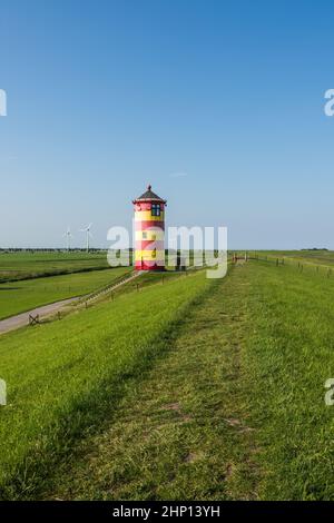 Faro di Pilsum, Pilsum, Krummhiern, Frisia orientale, bassa Sassonia, Germania Foto Stock