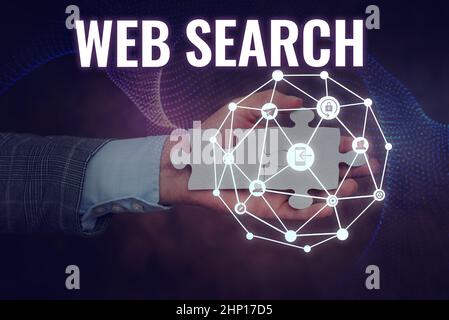 Scrittura visualizzazione testo Web Search, Conceptual Photo software system ideato per la ricerca di informazioni sul web Hand Holding Jigsaw Puzzle Piece un Foto Stock