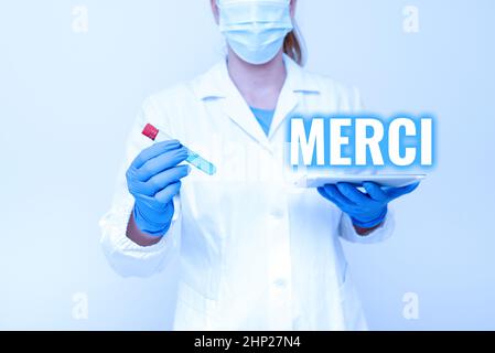 Scrittura mano segno Merci, foto concettuale che cosa è detto o risposta quando qualcuno vi aiuta in Francia grazie studiando New Medical Technology Analyzin Foto Stock