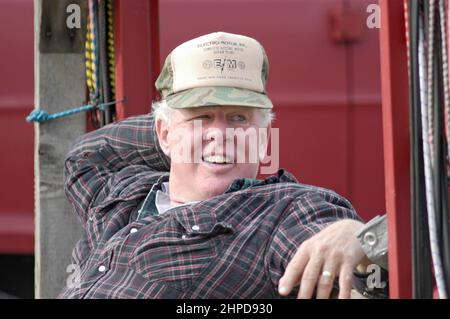 Coltivatore a swap meet in Paese Amish di Ohio, vendita di ciò che egli ha per i redditi in caduta dell'anno di coltivazione Foto Stock