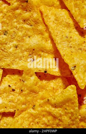 Chip macro nacho piatto, sfondo di chip Tortilla Corn Foto Stock