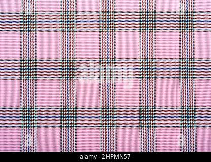 Tessuto scacchi giallo o marrone. Sfondo da tessuto scacchi. Materiale con linee rette e quadrati Foto Stock