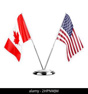 Due bandiere di tabella isolate su sfondo bianco 3D illustrazione, canada e stati uniti Foto Stock